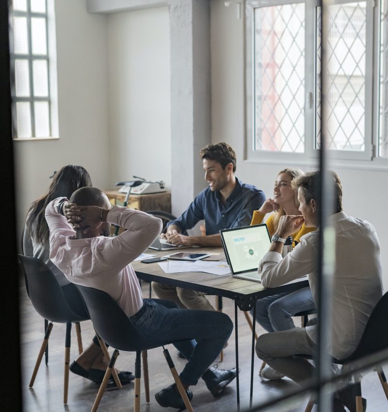 Business team having a meeting in loft office Business team having a meeting in loft office